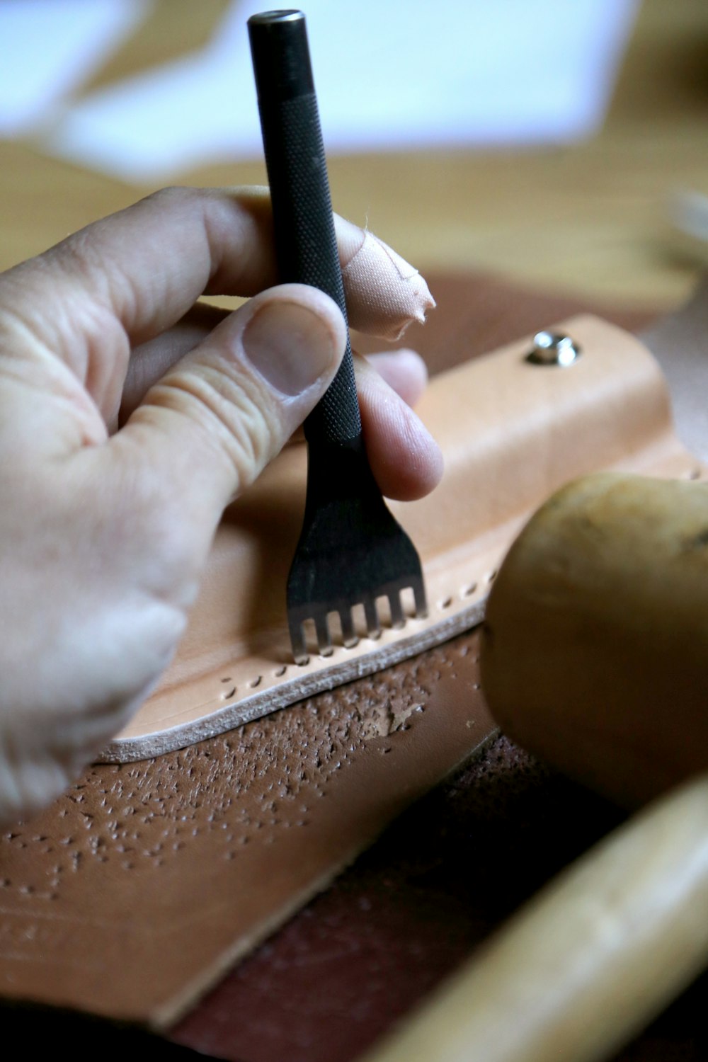 We use traditional tools to handcraft our leather goods.